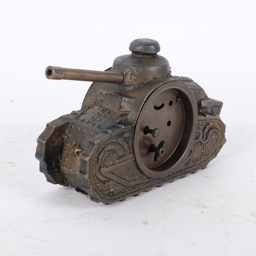 202 - An unusual embossed metal desktop clock, in the form of a tank, H10cm