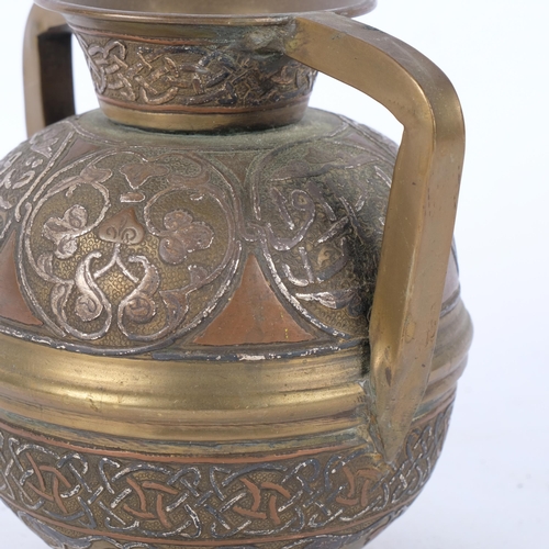 205 - An Oriental brass and silver overlaid 2-handled vase, H14cm