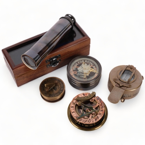 207 - A group of 4 reproduction brass compasses, and a small 2-draw telescope (5)