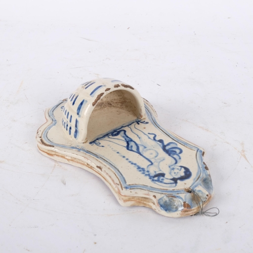 210 - A 19th century Delft tin glazed hand water font, L17cm