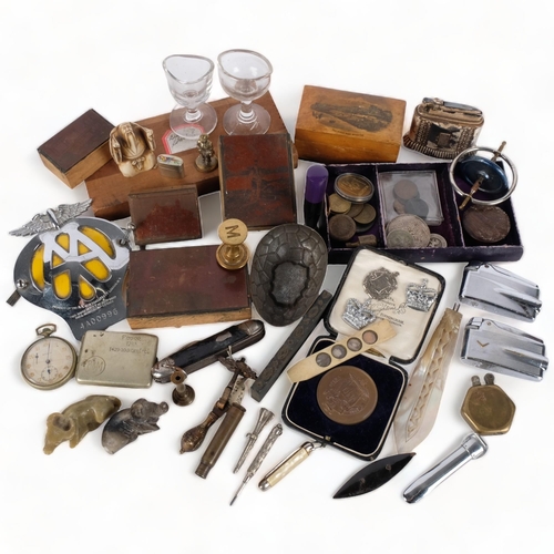 221 - A box of various items, to include an AA badge, Mauchline Ware box, printing blocks, penknife, Ronso... 