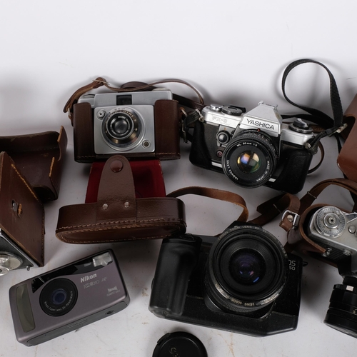 226 - A quantity of various Vintage cameras and equipment, including a Yashica FX-D quartz, a Halina-Vicer... 