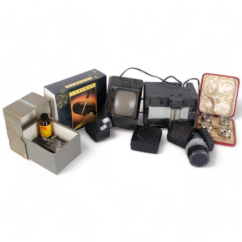 231 - A Hoya HMC 62mm UV (0) lens, a Bell & Howell model 604 film slicer 48mm and 16mm film, and various o... 