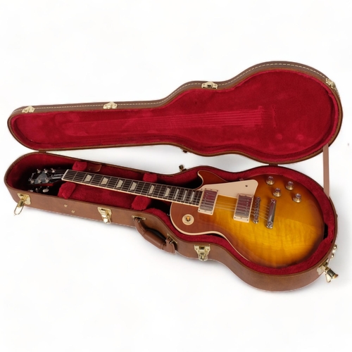 232 - A Gibson Les Paul Studio electric guitar, made in the USA, serial no. 212620336, with associated Gib... 