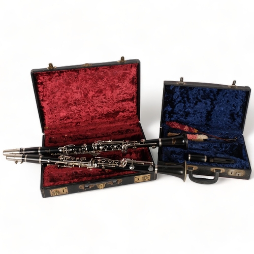 233 - A Boosey & Hawkes Emperor clarinet, serial no. 188747, a Student console Selmer clarinet, serial no.... 