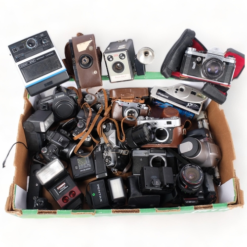 242 - A quantity of various Vintage cameras and associated accessories, including a Polaroid Joycam, a Top... 