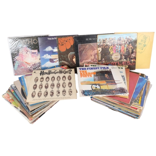 250 - A quantity of vinyl LPs, including such artists as Joni Mitchell, Fleetwood Mac, The Beatles, The Wh... 