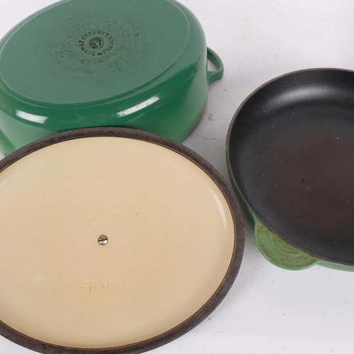 261 - LE CREUSET (FRANCE) - a green enamel cast-iron frying pan, and a Le Creuset 2-handled cooking pot, L... 