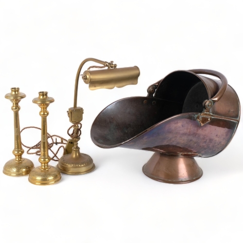 262 - An Antique copper coal scuttle, a pair of unmarked brass candlesticks, H28cm, and an unmarked brass ... 