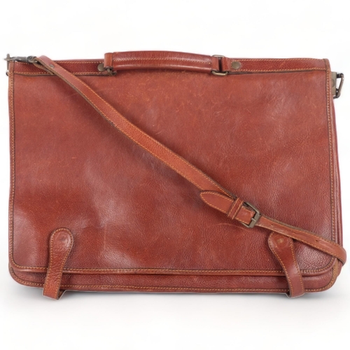 265 - A Vintage leather satchel, with 4 inside compartments, no identifiable maker's label