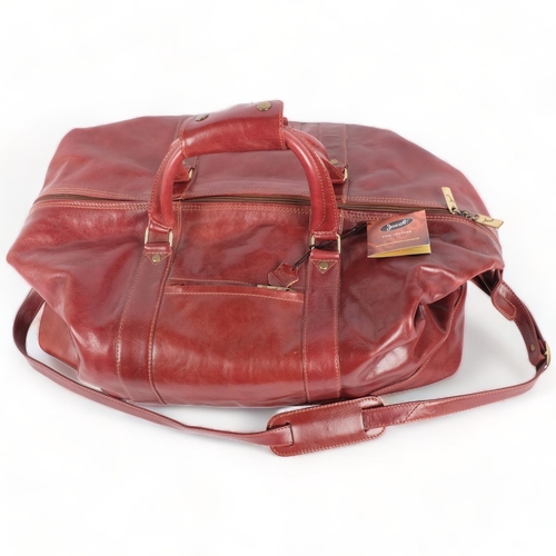 268 - Jacob Fine Leather, a large burgundy leather weekend bag, with original label, bag length approx 65c... 