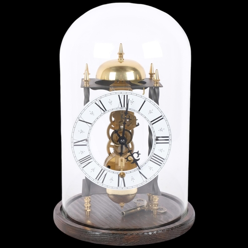 281 - A brass skeleton clock, under glass dome on plinth, height overall 31cm