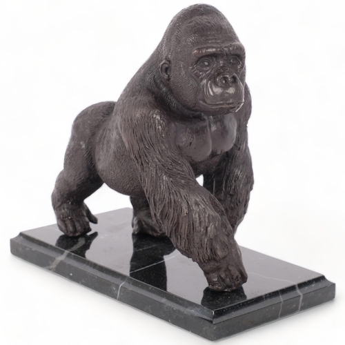 283 - A patinated bronze study of a gorilla, on marble plinth, H18.5cm