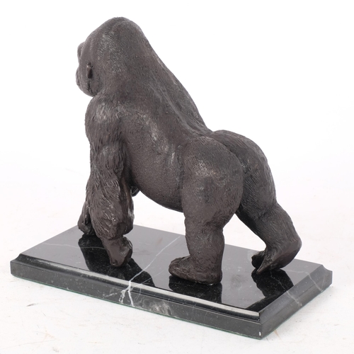 283 - A patinated bronze study of a gorilla, on marble plinth, H18.5cm