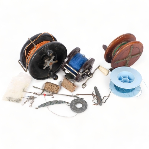 285 - An Alcock fishing reel, a Penn reel, etc