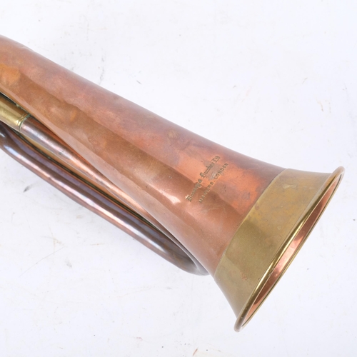 287 - A Boosey & Hawkes brass and copper bugle, L29cm