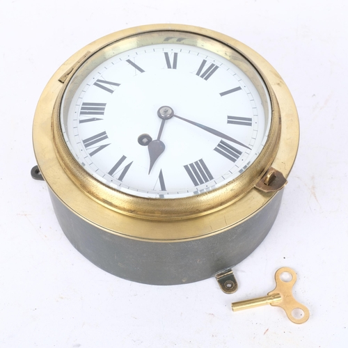 289 - A Vintage brass-cased ship's bulkhead clock with enamel dial, diameter 18.5cm overall