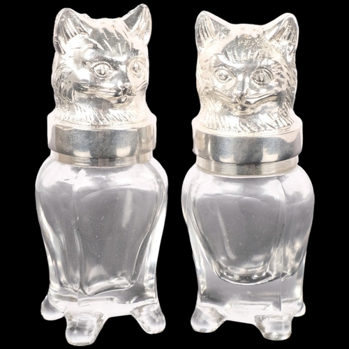 296 - A pair of glass cruets, with plated cats' heads tops, H12.5cm