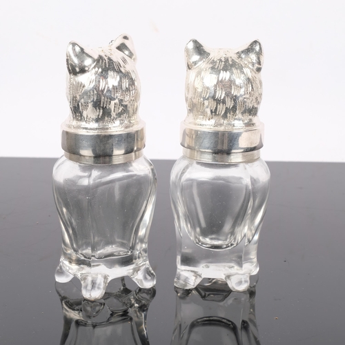 296 - A pair of glass cruets, with plated cats' heads tops, H12.5cm