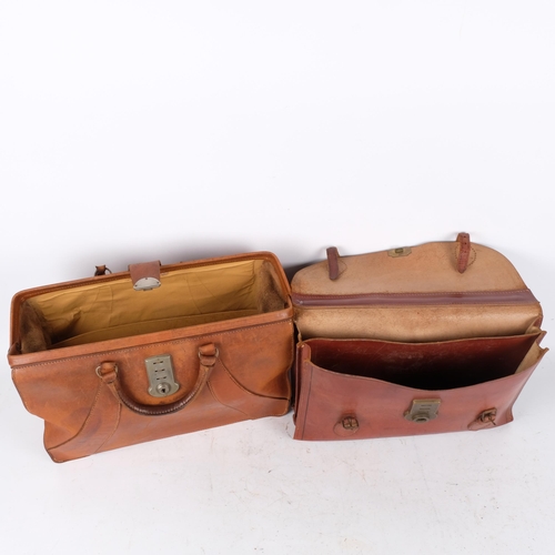 300 - A Vintage leather Gladstone bag, L45cm, and a leather attache case