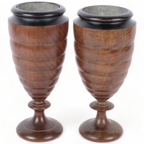 345 - A pair of turned wood vases, with metal liners, H22.5cm