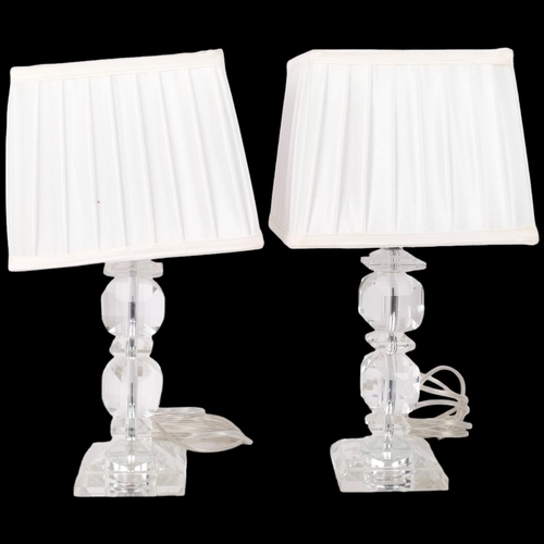 351 - A pair of modern decorative bevelled perspex table lamps, with white shades, H40cm