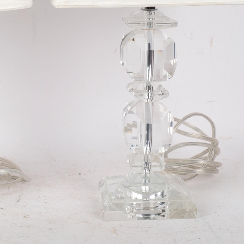 351 - A pair of modern decorative bevelled perspex table lamps, with white shades, H40cm