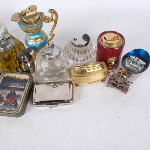 363 - A box containing Vintage table lighters and related items