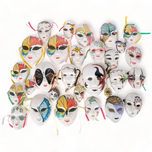 368 - A collection of painted ceramic masks, various sizes