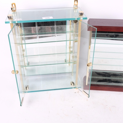 375 - A mirrored glass cabinet with glazed doors, H38cm overall, and an open mirrored glass display cabine... 