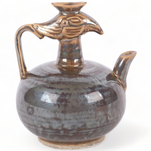 387 - A Chinese brown glazed jug with bird's head design, H13.5cm