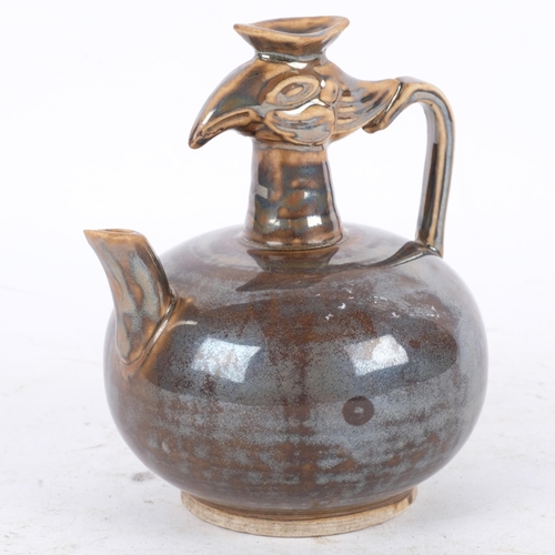 387 - A Chinese brown glazed jug with bird's head design, H13.5cm