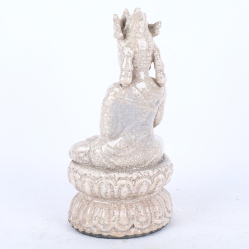 393 - A Chinese crackle glazed pottery Buddha, 28cm