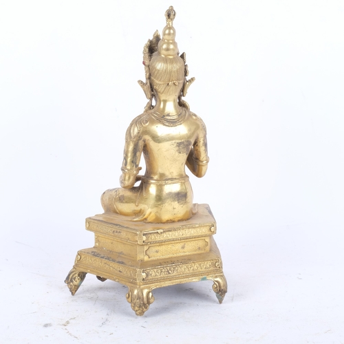 402 - Oriental gilt-bronze Buddha with stone set decoration, on stand, H24cm