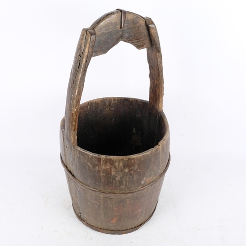 405 - A Chinese wooden well bucket, 54cm