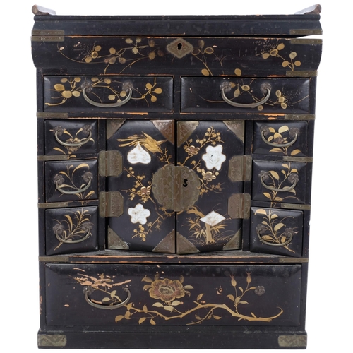 406 - Antique Oriental lacquered jewel cabinet, with rising top, fitted interior, and painted and gilded f... 