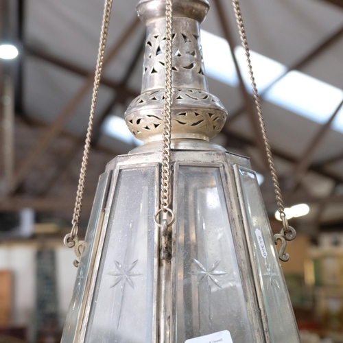 421 - An octagonal hanging glass lantern, with pierced metal mounts and engraved bevelled-glass panels, 20... 