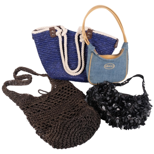 426 - A blue woven shopping basket, another, and 2 handbags