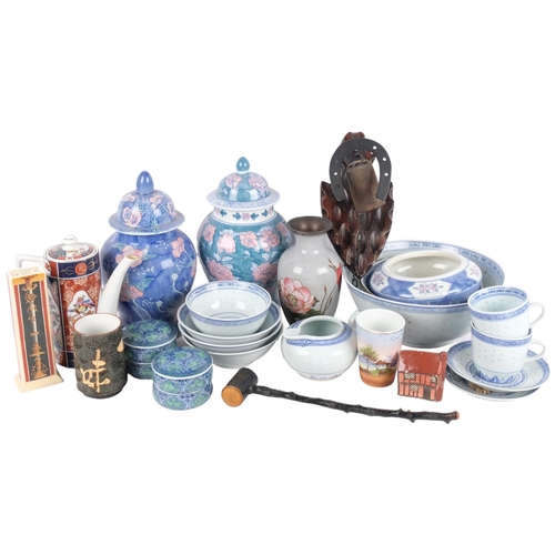 429 - A box of Oriental china jars and bowls, and a gong with striker