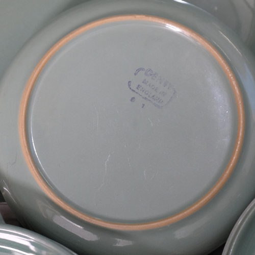 430 - A large quantity of green Denby stoneware dinnerware, including casserole dishes, plates, hot water ... 