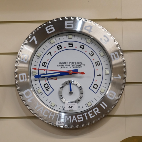 441 - A reproduction quartz wall clock, 32cm