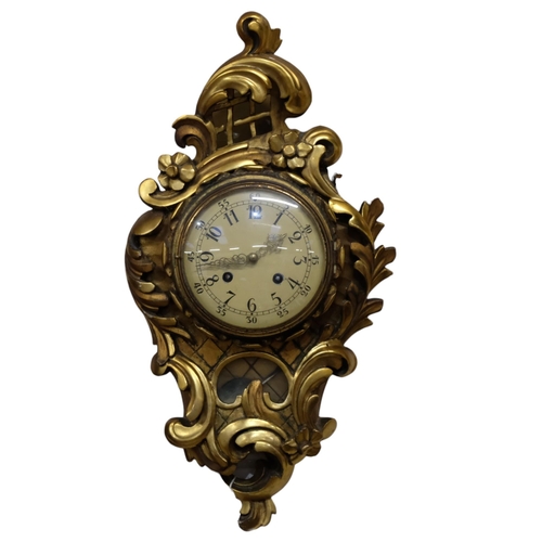 443 - A French gilt cartel wall clock, with 2-train movement and key, H60cm