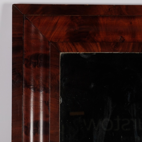 470 - A 18/19th century flame veneer mahogany cushion framed wall mirror, 75cm x 54cm