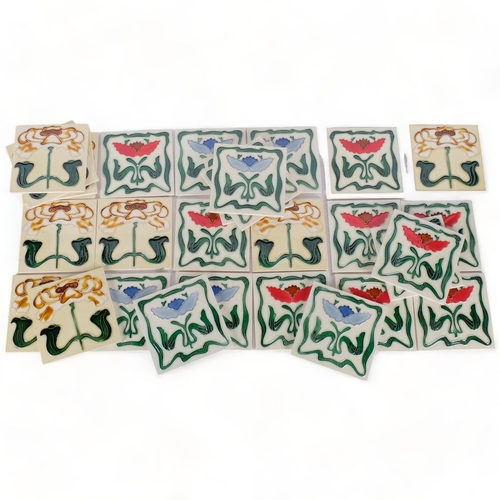 487 - A set of 29 modern Art Nouveau style tiles, with floral designs, 15cm