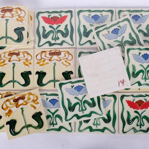 487 - A set of 29 modern Art Nouveau style tiles, with floral designs, 15cm