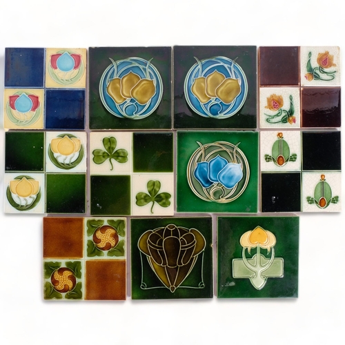 493 - A group of 11 decorative Edwardian and other tiles, 15cm