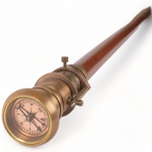 77 - A reproduction gadget cane, the top set with a compass and 2-draw telescope, L99cm