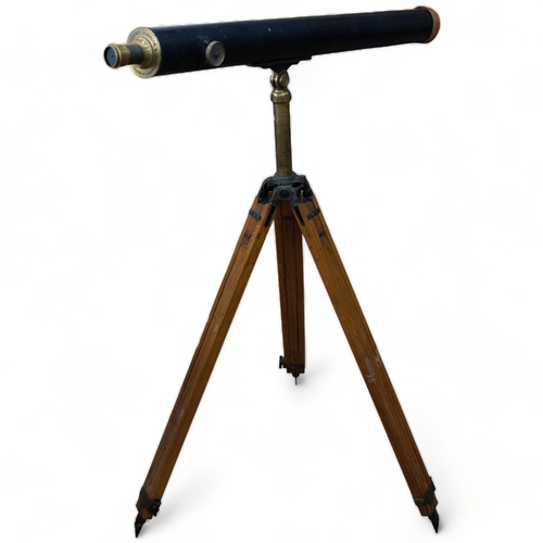 80 - BROADHURST CLARKSON & COMPANY - a Victorian brass-mounted telescope, on tripod stand, stand having a... 