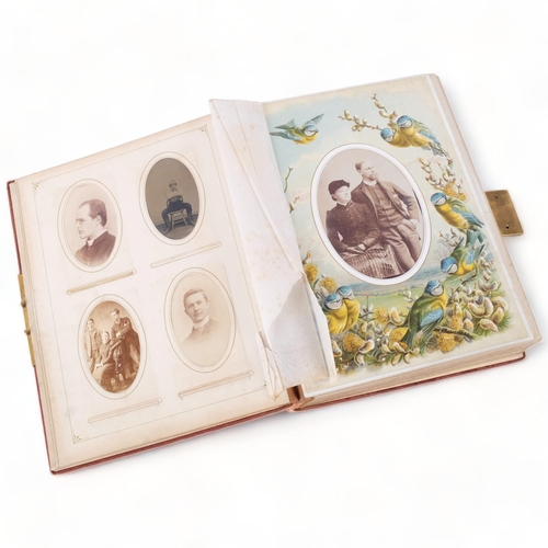 88 - A Victorian velvet covered photograph album, containing a collection of carte de visite and cabinet ... 