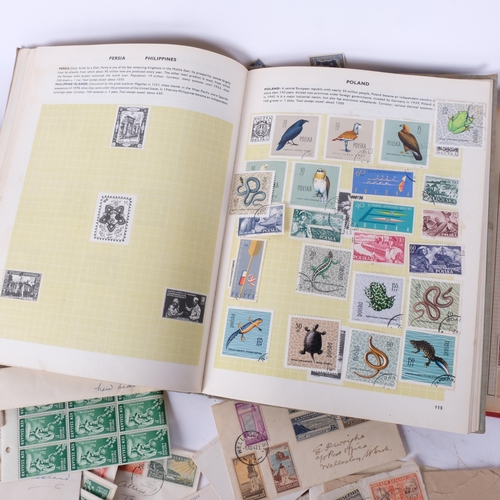 93 - A box of various loose worldwide stamps, and a stock book